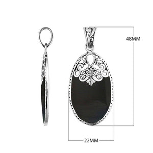 Wholesale sterling silver oval pendant with genuine black shell inlay and ornate Balinese filigree detailing, handcrafted in Bali.