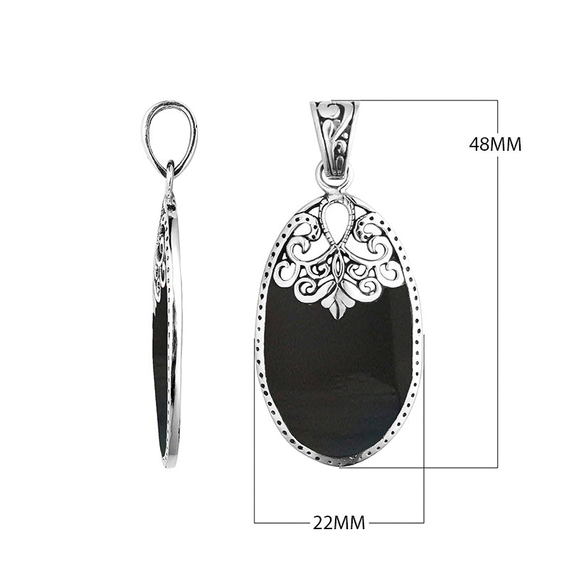 Wholesale sterling silver oval pendant with genuine black shell inlay and ornate Balinese filigree detailing, handcrafted in Bali.