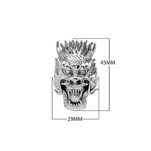 Wholesale sterling silver dragon head pendant with intricate carving, handcrafted Bali artisan jewelry for bulk buyers.
