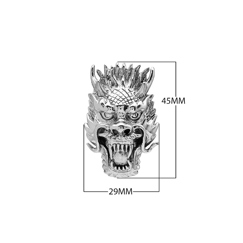 Wholesale sterling silver dragon head pendant with intricate carving, handcrafted Bali artisan jewelry for bulk buyers.