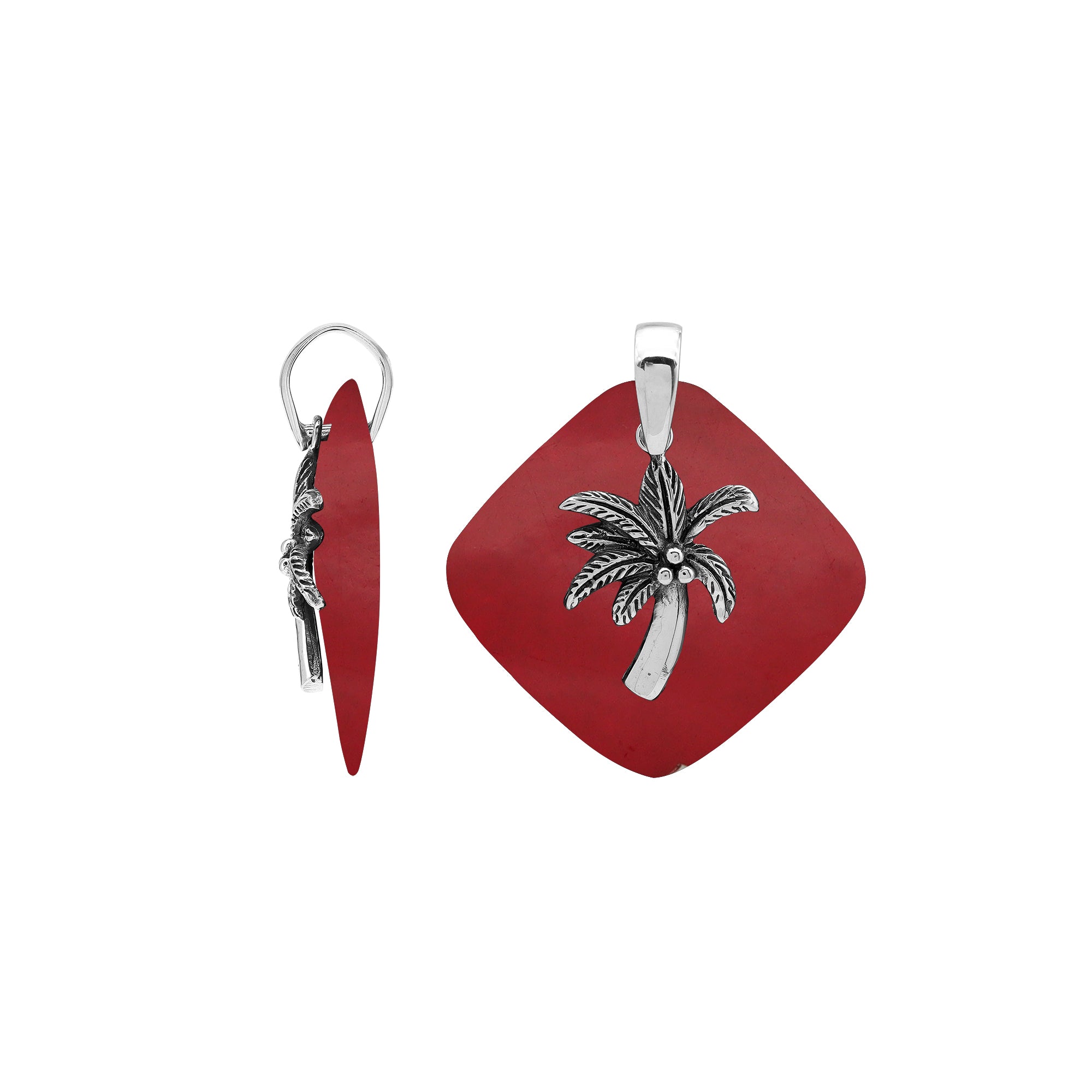 Sterling silver palm tree pendant on coral diamond-shaped base, handmade in Bali for wholesale jewelry buyers.