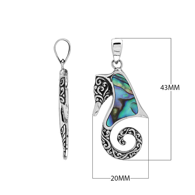 Sterling silver seahorse pendant with abalone shell inlay and Balinese scroll detailing, handmade in Bali for wholesale buyers.
