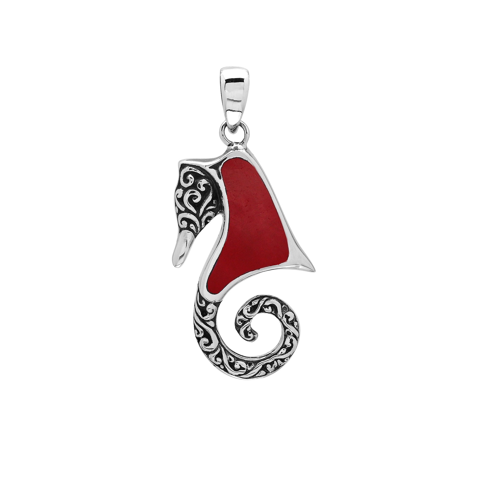 Sterling silver seahorse pendant with coral inlay and Balinese scroll detailing, handmade in Bali for wholesale buyers.