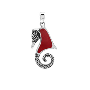Sterling silver seahorse pendant with coral inlay and Balinese scroll detailing, handmade in Bali for wholesale buyers.
