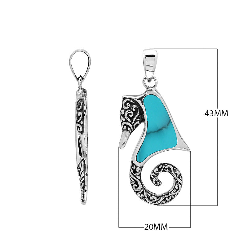 Sterling silver wholesale seahorse pendant with turquoise shell inlay and Balinese design.