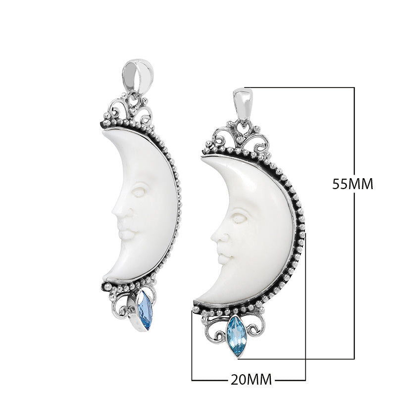 Sterling silver crescent moon pendant with carved bone face and marquise blue topaz quartz, Balinese artisan jewelry.