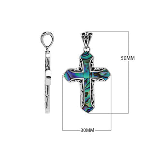 Sterling silver cross pendant with abalone shell inlay and Balinese silver detailing, wholesale artisan jewelry.
