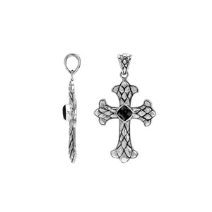 Sterling silver cross pendant with faceted black onyx and Balinese textured silver design, wholesale artisan jewelry.