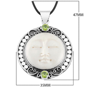Wholesale Peridot Quartz and carved bone face sterling silver pendant handcrafted in Bali with Balinese artistry.