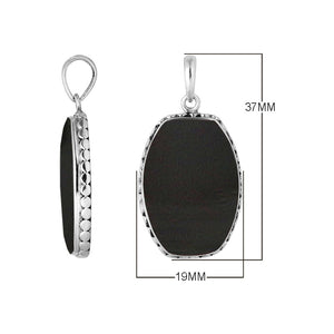 Alt Text: Sterling Silver Rectangular Pendant Featuring Black Shell Centerpiece