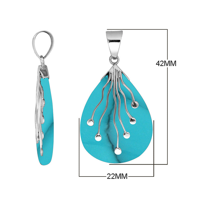 Wholesale sterling silver teardrop pendant with vibrant Turquoise Shell and flowing silver wire accents – handcrafted artisan jewelry for retailers and resellers.