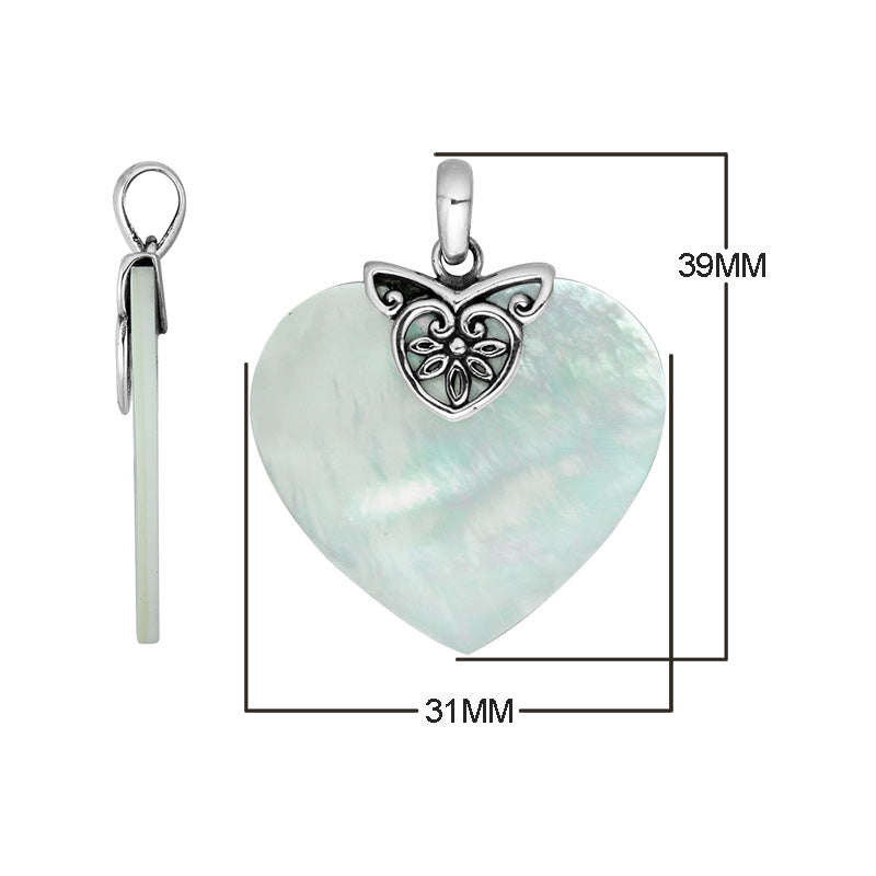 High-quality Sterling Silver Heart Pendant with radiant Mother Of Pearl and intricate filigree silver detailing, handcrafted by Balinese artisans for elegant wholesale jewelry collections.