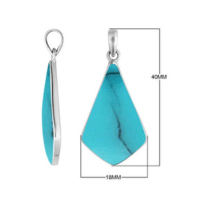Sterling silver Turquoise Shell geometric shield pendant with broad angular silhouette and polished bezel frame