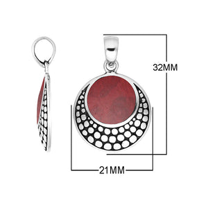 Round sterling silver pendant with red coral and dotted Balinese frame handcrafted in Bali.