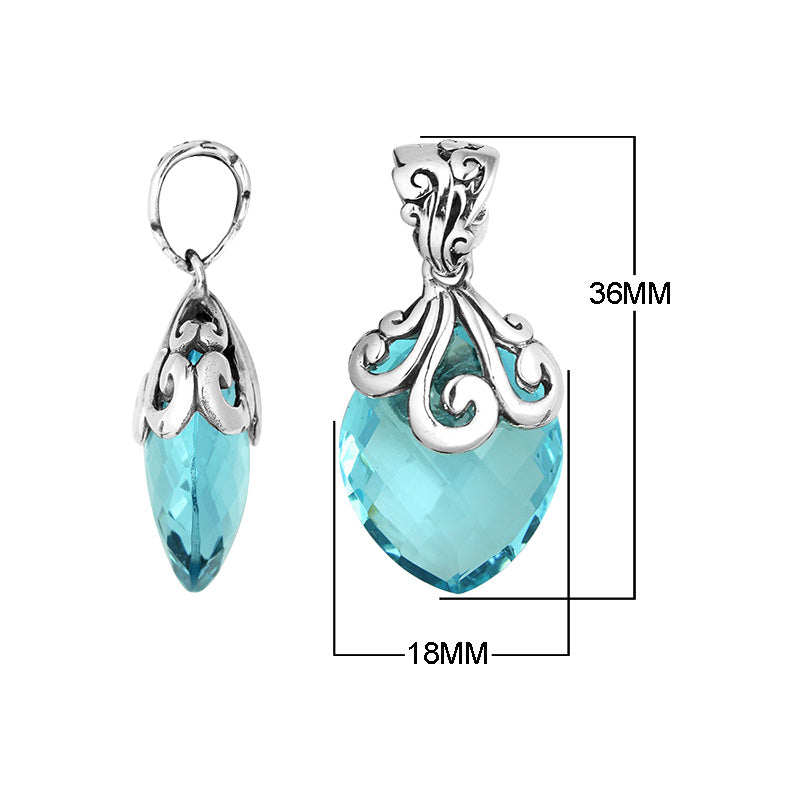 Handcrafted 925 Sterling Silver Blue Topaz Quartz pendant with intricate swirl filigree pattern, mirror-polished surface, and Balinese-inspired marquise shape design for wholesale jewelry suppliers.