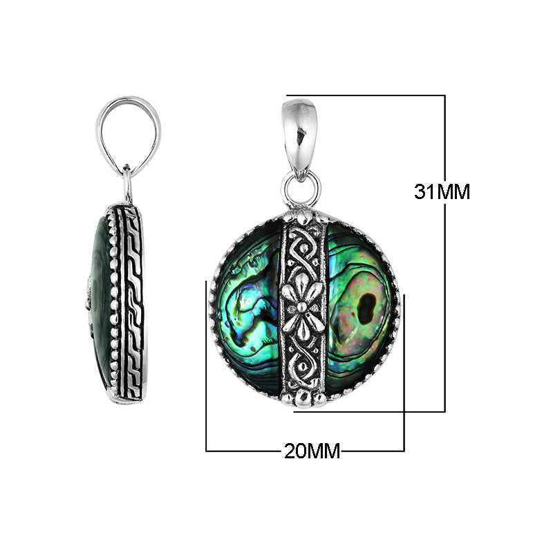 Handcrafted 925 Sterling Silver Abalone Shell round pendant featuring floral center pattern, mirror-polished finish, and iridescent tones with detailed Balinese silver artistry for wholesale buyers.