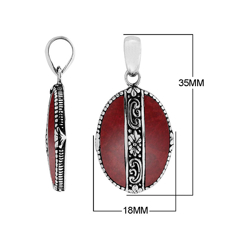 Handcrafted 925 Sterling Silver Red Coral oval pendant with detailed floral center design, mirror-polished finish, and traditional Balinese artistry for wholesale jewelry catalogs.66-CR Sterling Silver Pendant With Coral Jewelry Bali Designs Inc 