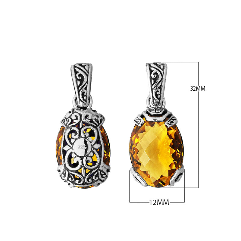 A handcrafted sterling silver pendant featuring a vivid Citrine Quartz framed in intricate Balinese filigree, showcasing traditional artistry and golden radiance.
