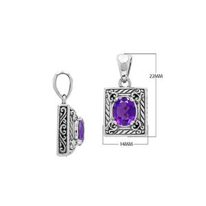 Rectangular sterling silver pendant featuring an oval amethyst quartz, detailed swirl patterns, and a smooth polished finish with traditional Balinese craftsmanship.