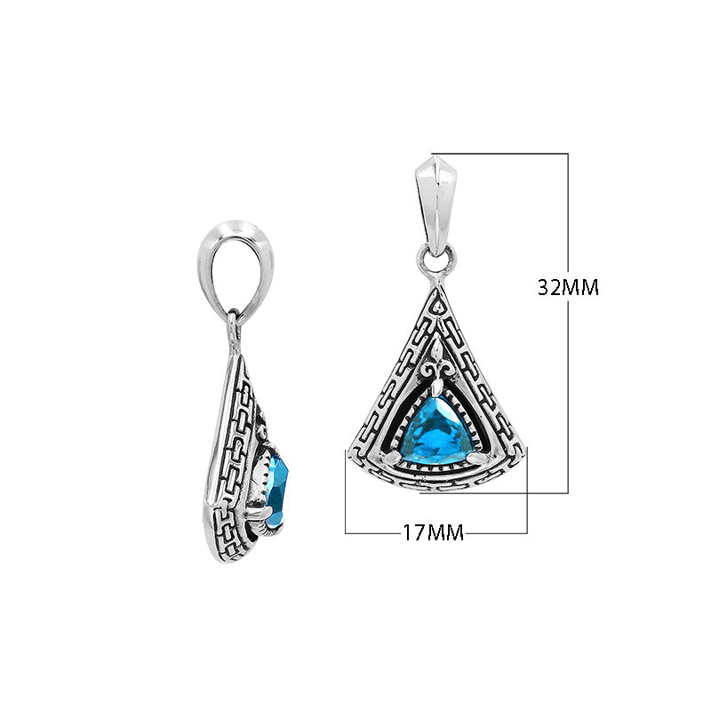 Triangular sterling silver pendant featuring trillion-cut blue topaz quartz with geometric engraving and polished Balinese finish.