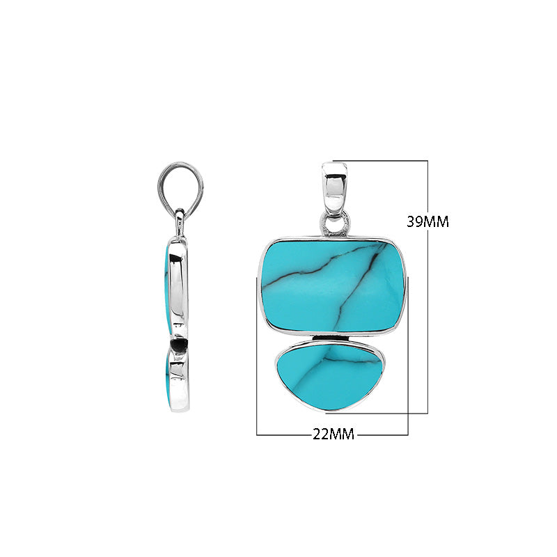 Sterling silver pendant featuring double Turquoise Shell stones with a polished surface and detailed Balinese craftsmanship.