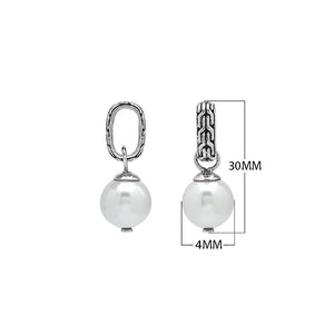 Sterling silver round drop pendant featuring a single Mabe Pearl and intricate Balinese silver detailing with mirror-polished finish.
