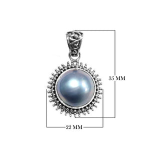 Sterling silver round pendant with gray Mabe Pearl and oxidized Balinese handcrafted beaded frame.