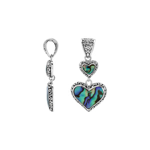 Sterling silver double heart pendant with Abalone Shell and Balinese detailing in polished finish.