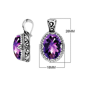Sterling silver oval pendant featuring a vibrant Amethyst Quartz centerpiece surrounded by intricate Balinese scroll carvings and a smoothly polished artistic frame design.