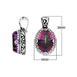 Sterling silver oval pendant featuring a vivid Ruby Quartz centerpiece highlighted by detailed Balinese scroll carvings and a smoothly polished artistic frame design.
