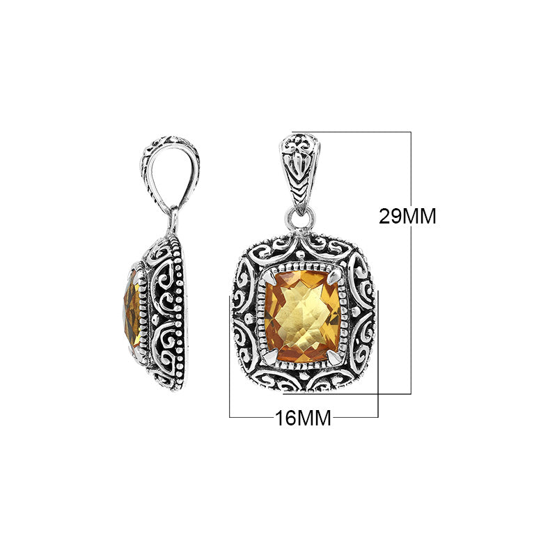 Sterling silver cushion pendant featuring a faceted Citrine Quartz centerpiece accented with intricate Balinese scroll carvings and a polished decorative frame.