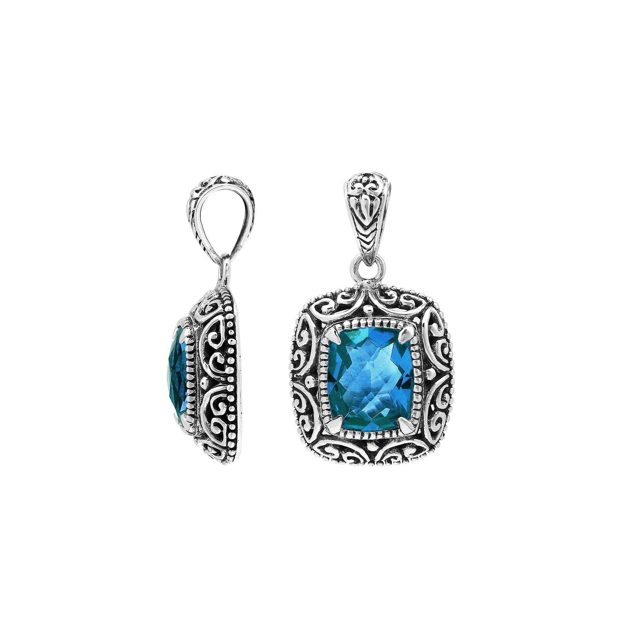 Sterling silver cushion pendant featuring a faceted London Blue Topaz Quartz centerpiece accented with ornate Balinese scroll carvings and a polished decorative frame.