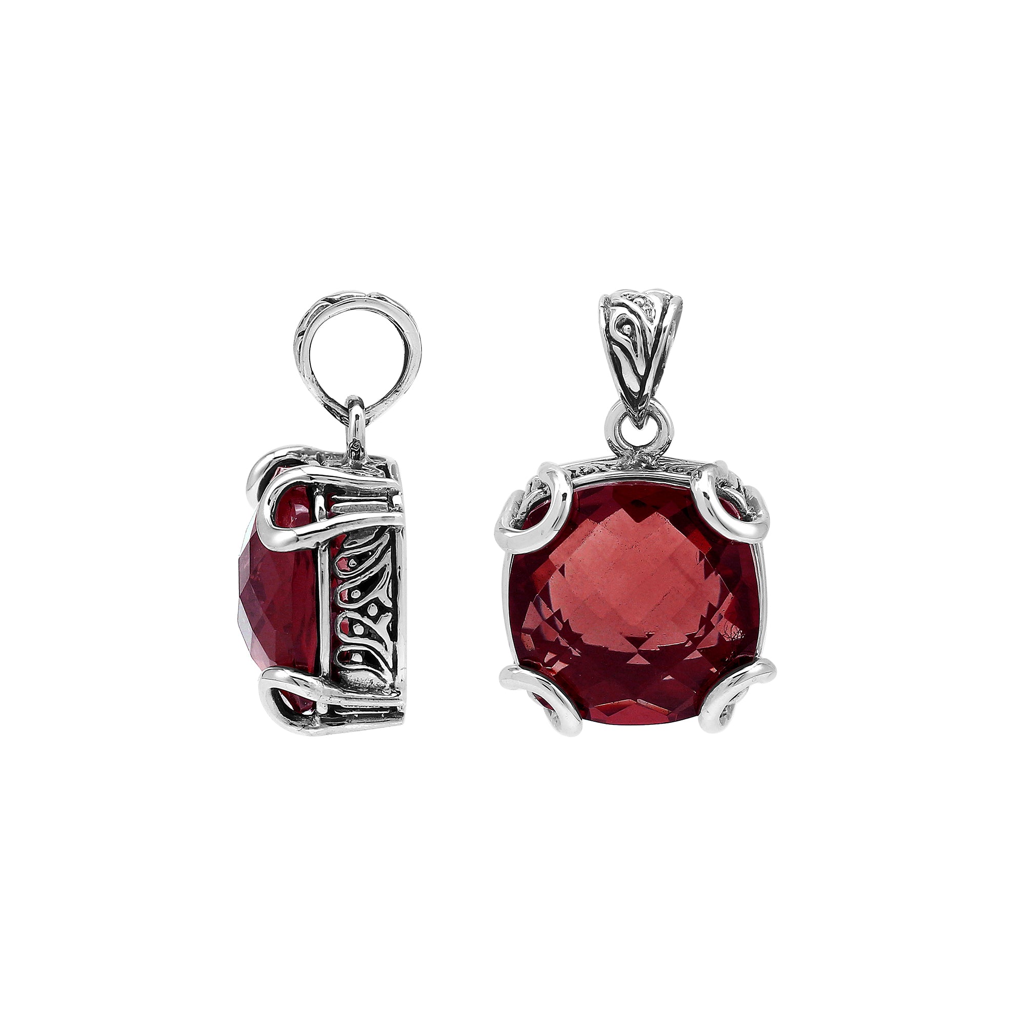 Sterling silver cushion pendant featuring a deep-toned Red Garnet Quartz center secured with artistic prong detailing and traditional Balinese carved accents.