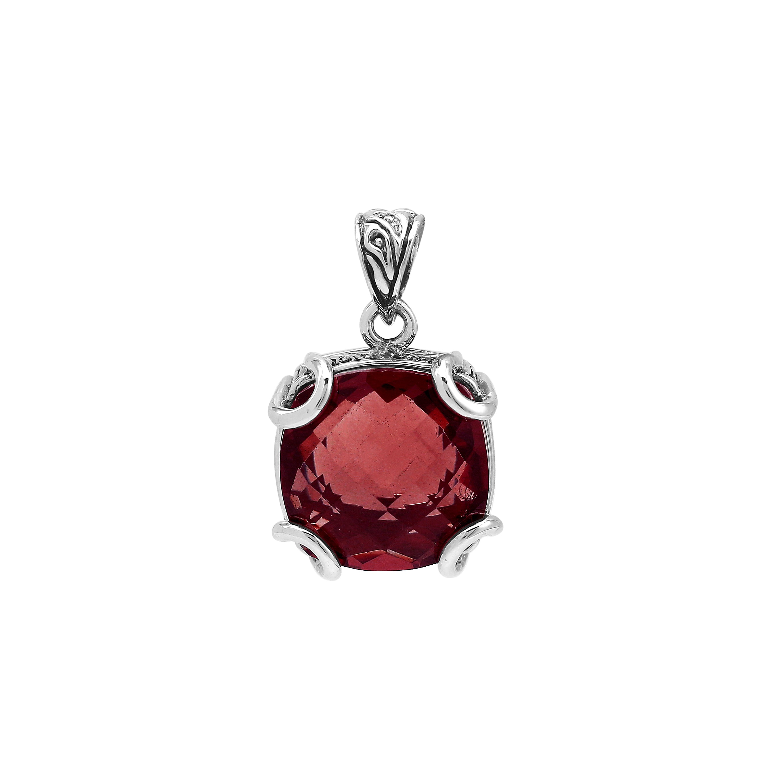 Sterling silver cushion pendant featuring a deep-toned Red Garnet Quartz center secured with artistic prong detailing and traditional Balinese carved accents.