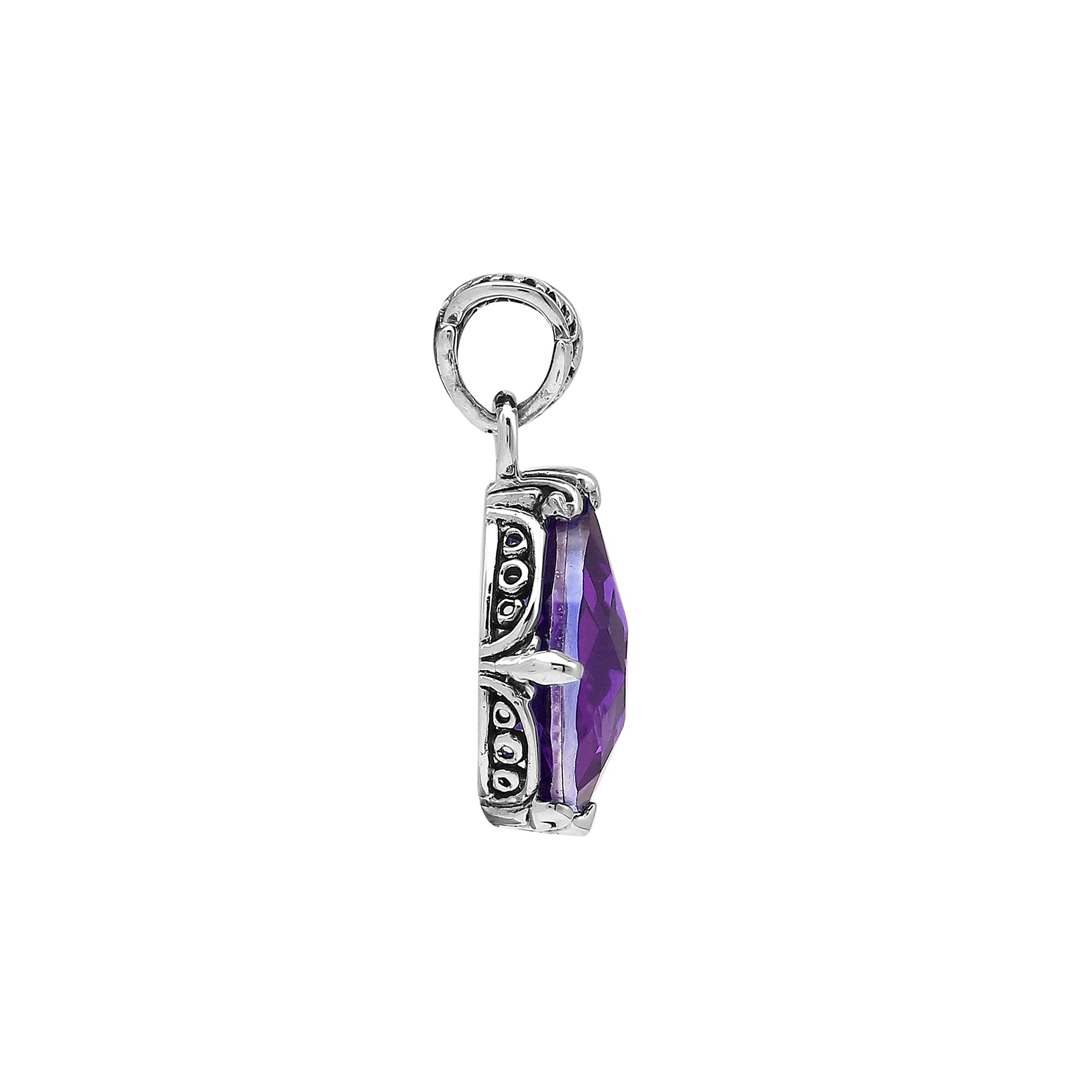 Sterling silver pear-shaped pendant featuring a faceted Amethyst Quartz centerpiece with polished prong-setting and traditional Balinese carved ornamental accents.