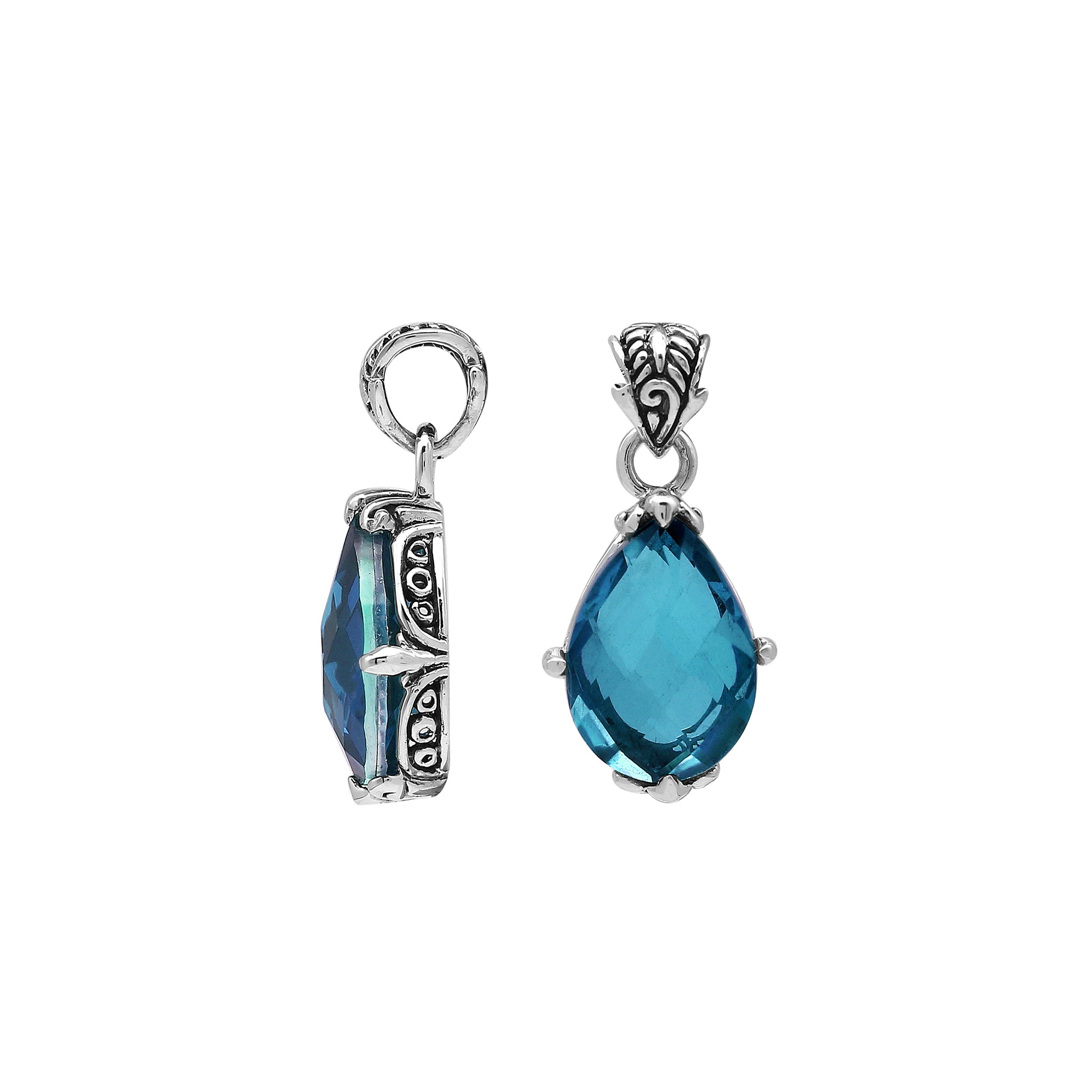 Sterling silver pear-shaped pendant featuring a faceted London Blue Topaz Quartz center with polished prong-setting and traditional Balinese carved ornamental detailing.