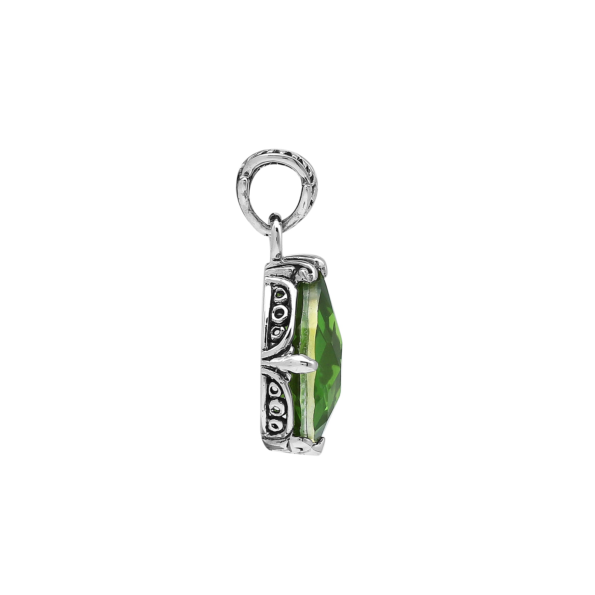 Sterling silver pear-shaped pendant featuring a faceted Peridot Quartz centerpiece with polished prong-setting and detailed Balinese carved ornamental accents.