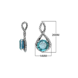 Sterling silver twisted loop pendant featuring a faceted Blue Topaz Quartz center with detailed Balinese engraving and polished round artistic setting.