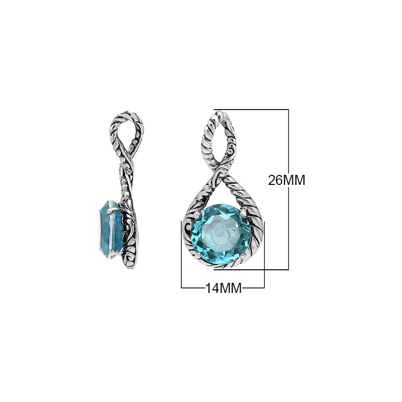 Sterling silver twisted loop pendant featuring a faceted Blue Topaz Quartz center with detailed Balinese engraving and polished round artistic setting.