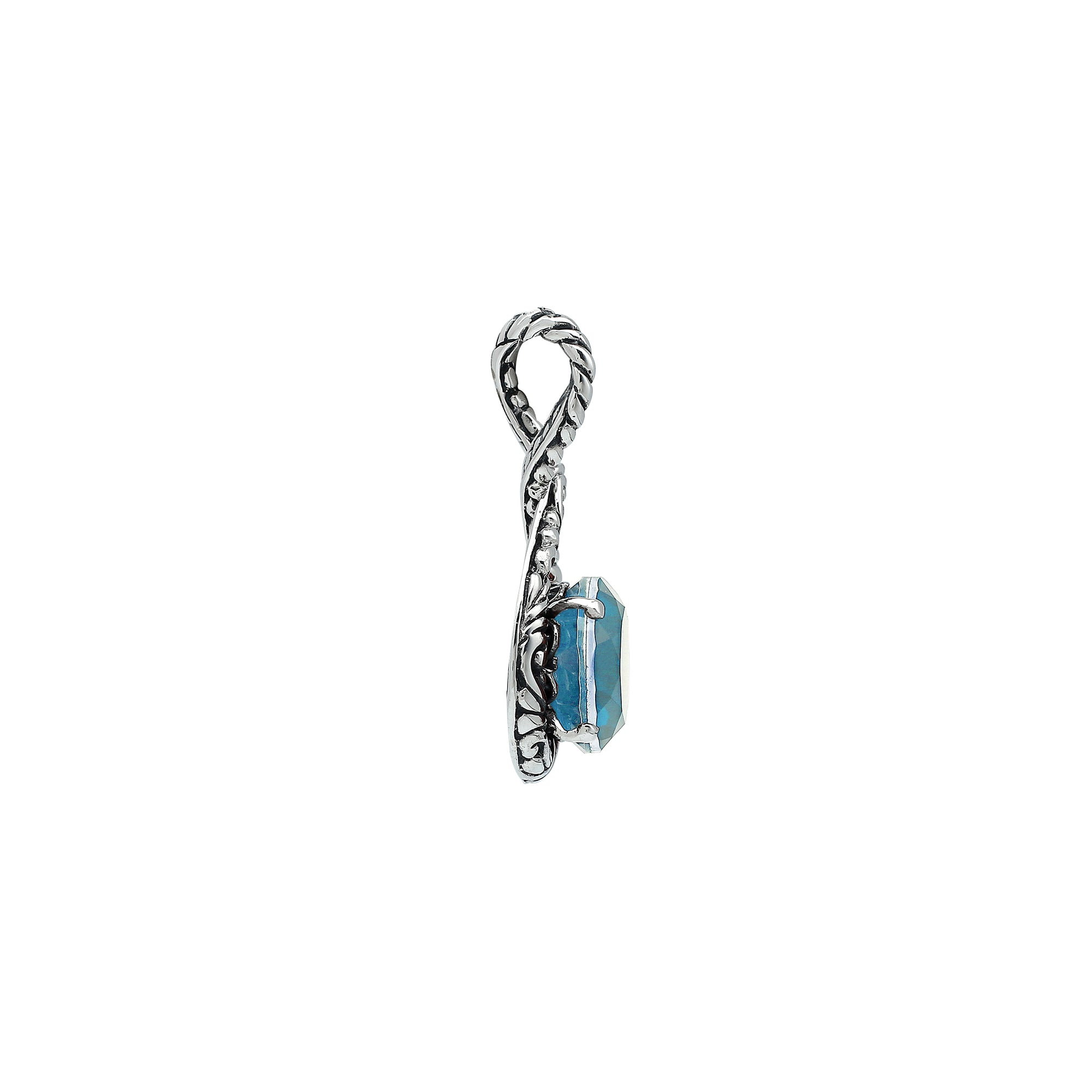 Sterling silver twisted loop pendant featuring a faceted Blue Topaz Quartz center with detailed Balinese engraving and polished round artistic setting.