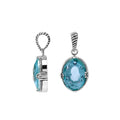 Sterling silver oval pendant with faceted Blue Topaz Quartz and rope-accent Balinese detail.