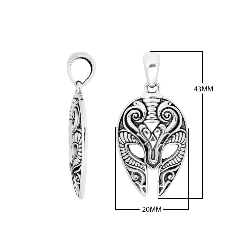 Sterling silver mask-shaped pendant featuring engraved tribal detailing, polished borders, and textured elements suitable for classic wholesale jewelry collections and retail displays