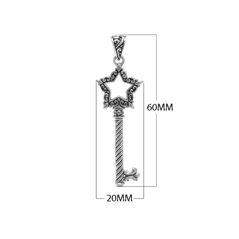 Sterling silver star-shaped key pendant with decorative filigree detailing, twisted stem design, and polished finish suitable for wholesale jewelry collections