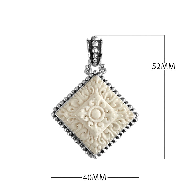 Wholesale sterling silver square pendant with carved bone centerpiece.