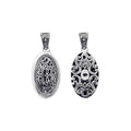 A wholesale Silver Overlay Over Copper oval pendant featuring intricate Balinese filigree detailing, oxidized depth, ornate scrollwork, and polished silver highlights ideal for bulk jewelry buyers.