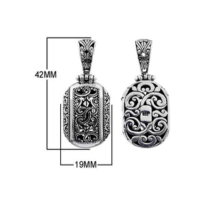 A wholesale Silver Overlay Over Copper oval pendant featuring ornate Balinese scrollwork, oxidized detailing, polished highlights, and a refined silver overlay design ideal for bulk jewelry buyers.