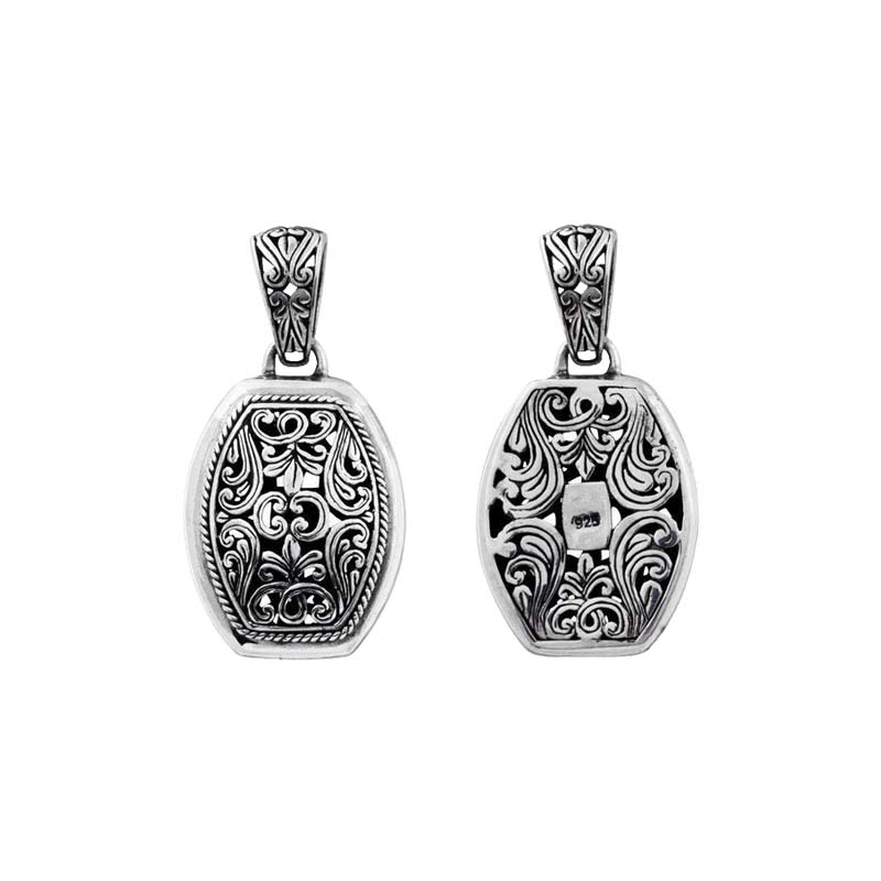 A wholesale Silver Overlay Over Copper oval pendant featuring detailed Balinese scrollwork, oxidized antique textures, polished overlay accents, and traditional filigree artistry ideal for bulk jewelry buyers.