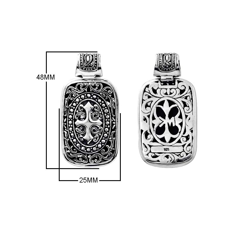 A wholesale Silver Overlay Over Copper rectangular pendant featuring deep oxidized Balinese scrollwork, raised detailing, polished overlay texture, and traditional craftsmanship ideal for bulk jewelry buyers.