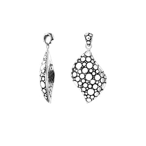A wholesale Silver Overlay Over Copper pendant featuring an abstract bubble cutout design, oxidized detailing, polished edges, and a modern wave silhouette ideal for bulk jewelry orders.