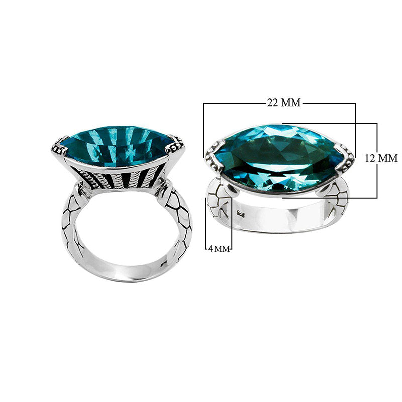 Wholesale sterling silver marquise-cut blue topaz ring with Bali-inspired band design – bulk gemstone statement jewelry for resellers.